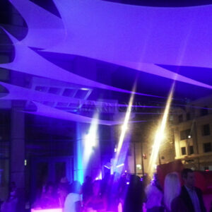 Outdoor stretch canopy setup by harmony rental